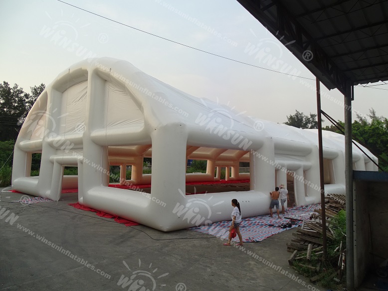 Outdoor inflatable arch tent hangar